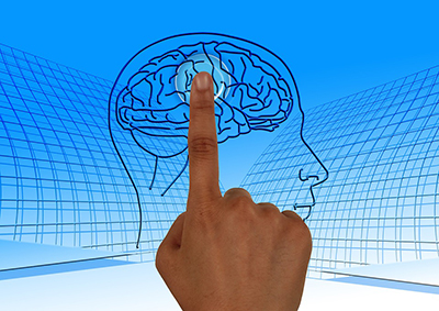 Finger pointing to brain