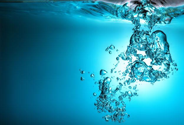 How does a carbonated water cooler work